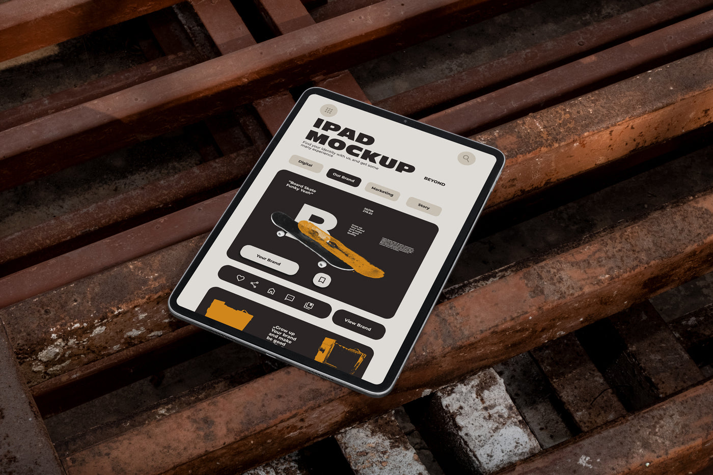 iPad mockup lying at an angle on rusty industrial metal grates outdoors, screen displaying app UI design, dark urban street style